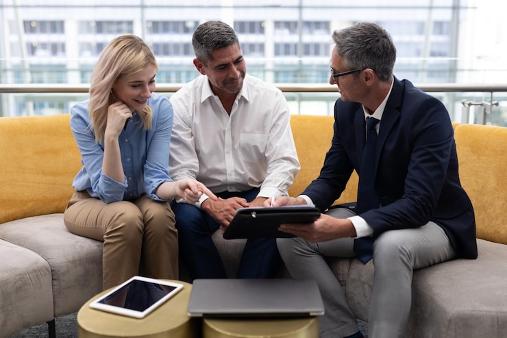 Employment lawyer advising clients during a workplace legal consultation